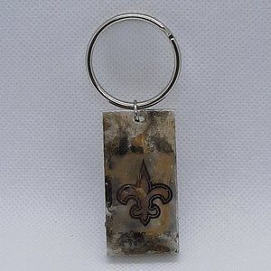 Saints Keychain in Gold